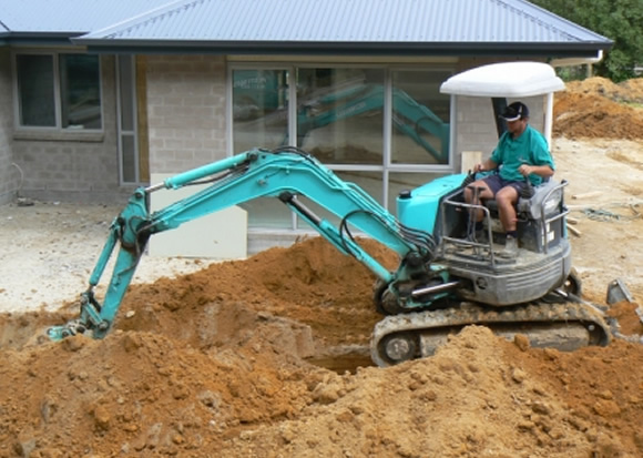 Plumberman doing drainlaying